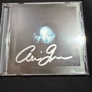 Ariana Grande don signed eternal sunshine deluxe D2C CD with imperfect Silver